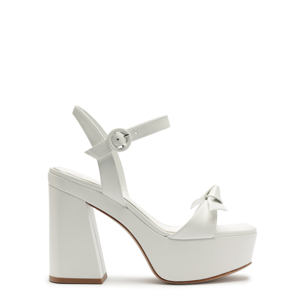 Side view of Clarita Bridal Flare Platform in Bridal Pearl/White with bow, ankle buckle, and block heel on white background