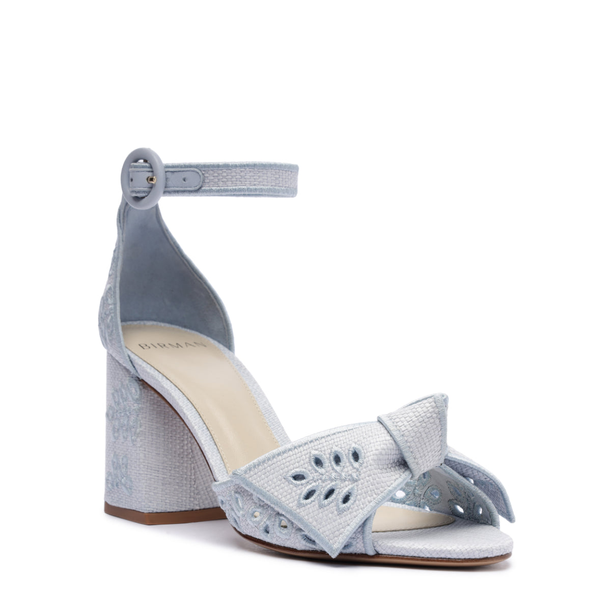 Three-quarter view of Maxi Clarita Embroidery 75 in Serene Blue showcasing cut-out embroidery and block heel with white background