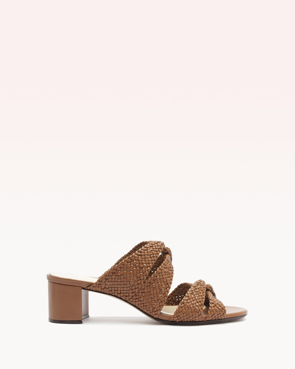 Side view of Sabrina 45 mule in espresso showcasing braided woven leather straps and 2-inch block heel on pale gradient background
