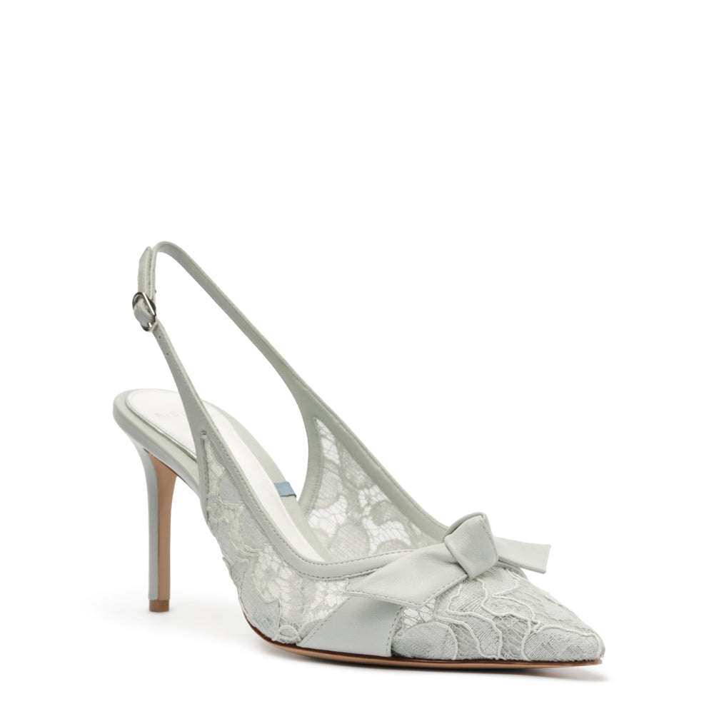 Side view of Clarita Classic Slingback 85 in Ice with lace upper, bow, pointed toe and slingback strap on white