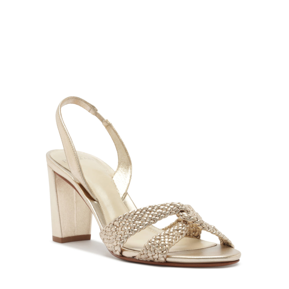 Three-quarter view of Sabrina 75 sandal showcasing braided metallic leather straps and block heel on white background
