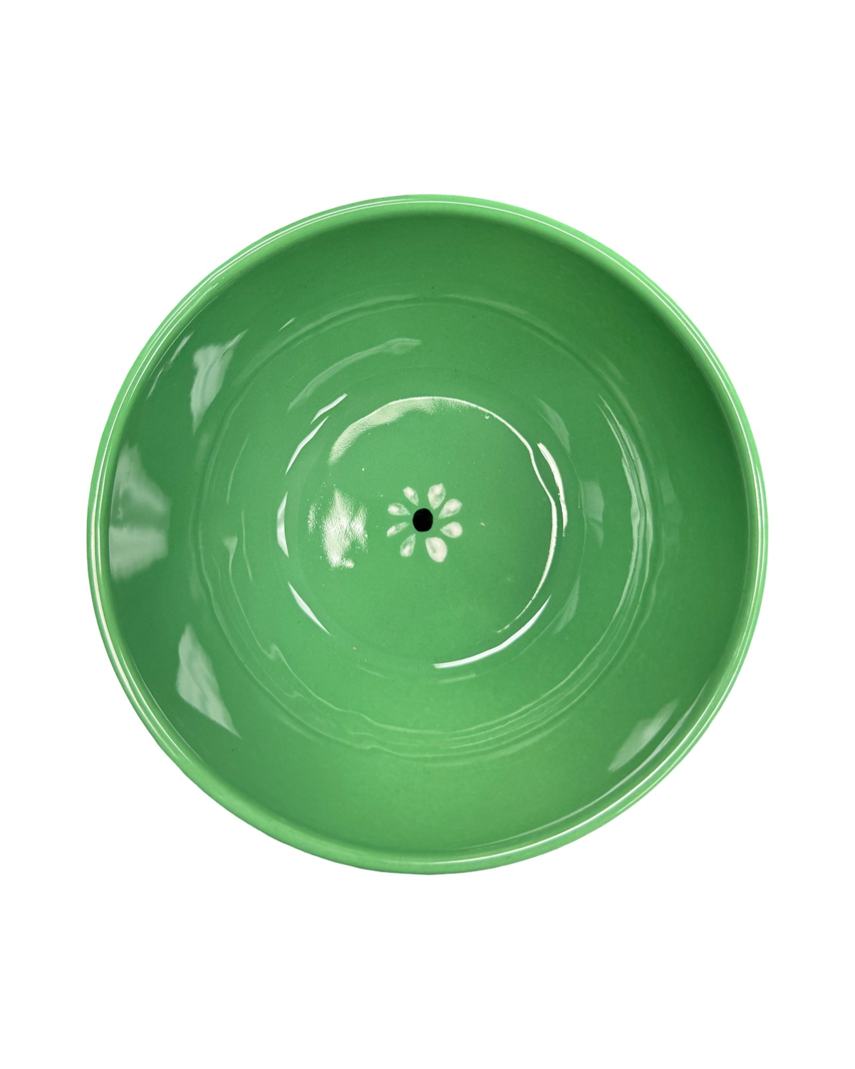 Top view of Gigi Green Cereal Bowl showcasing its green hand-painted ceramic finish and geometric wave border on a white background