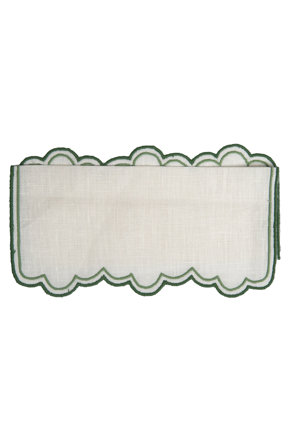 Top view of Escama cocktail napkin showing white linen and green double scalloped embroidered edge on white background