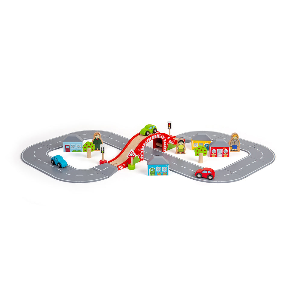 Angled view of Figure of 8 Roadway showcasing grey road tracks, red bridge, cars, houses, and road accessories on white background