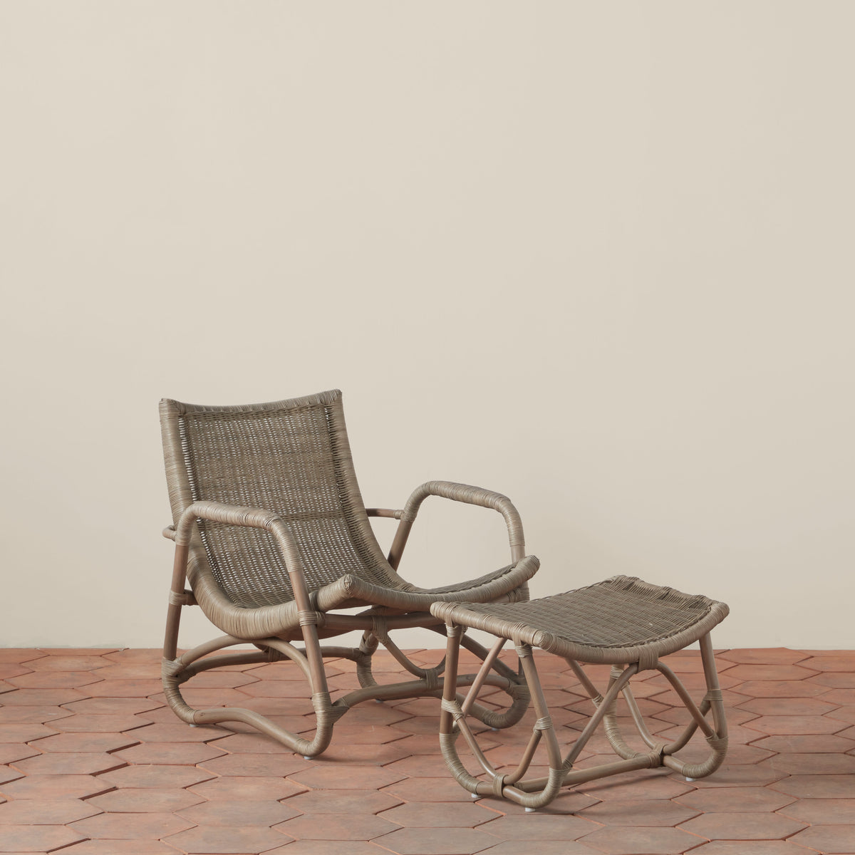 bodega wicker lounge chair and ottoman in mushroom side