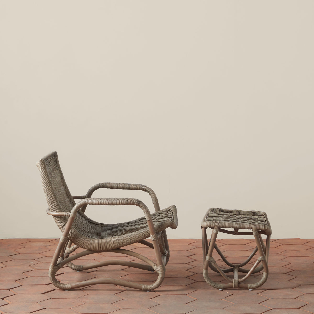 bodega wicker lounge chair and ottoman in mushroom side