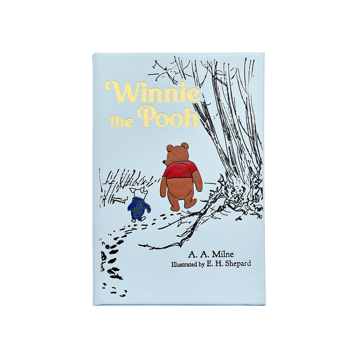 Front view of Winnie the Pooh leather-bound hardcover with gold-embossed title and Pooh and Piglet on light blue cover