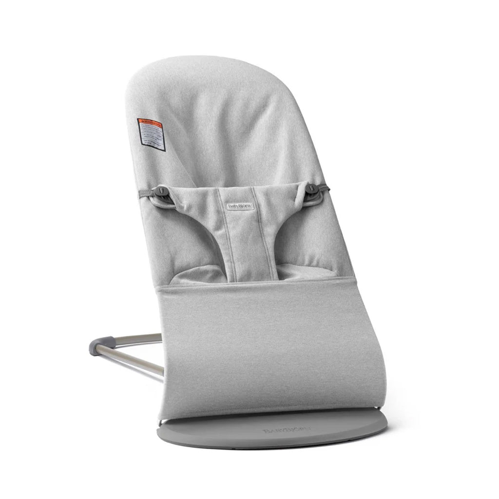 Three-quarter front view of BabyBjorn Bouncer Bliss bouncer in woven melange light gray with 3-point harness and gray base