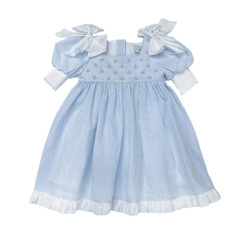 Baby blue linen girls dress with faux pearl hand beading, white shoulder bows, empire waist, puff sleeves, and large back tie bow.