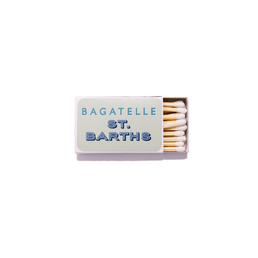 Front view of open matchbook labeled ‘Bagatelle St. Barths’ showing wooden matches on white background