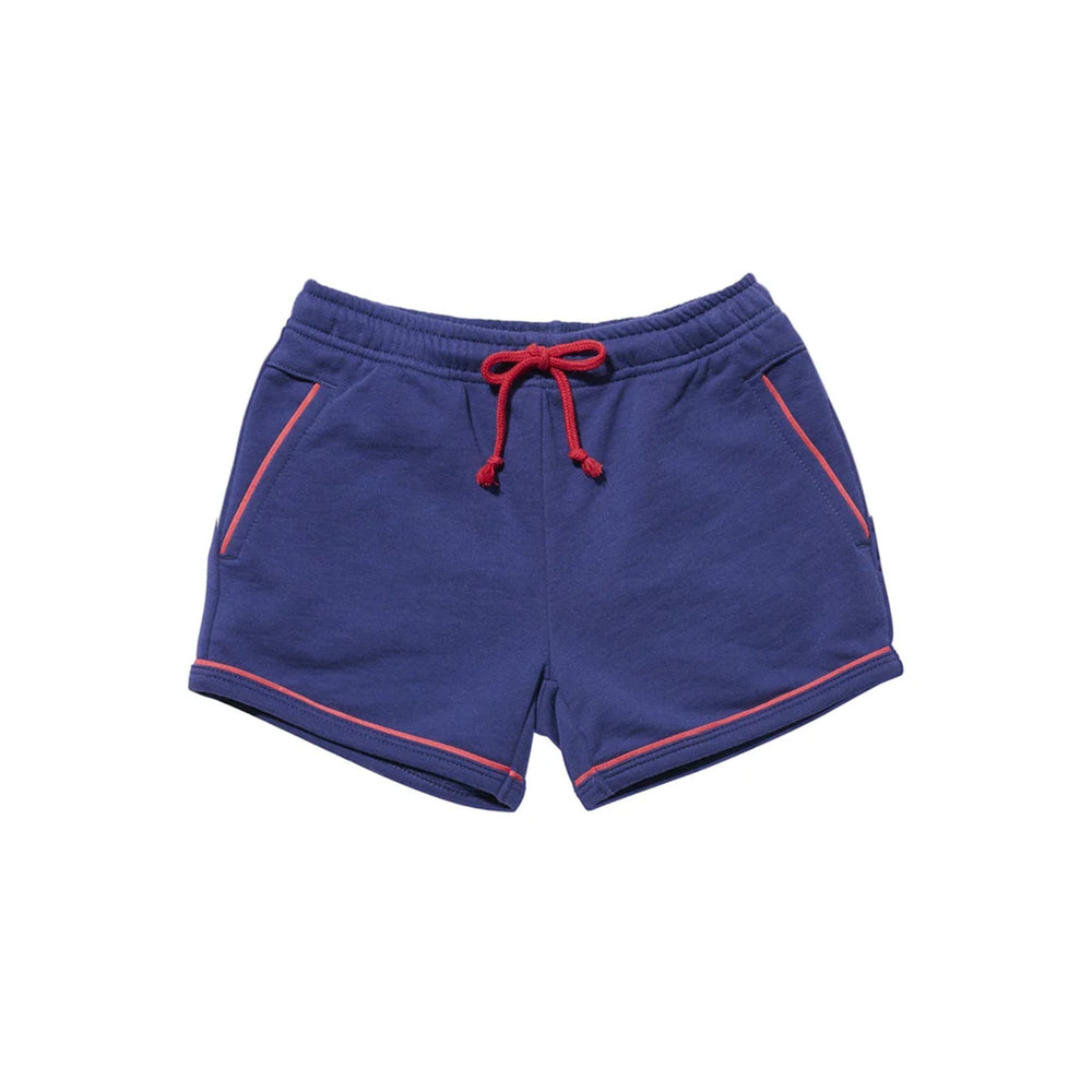 Front flat-lay of Bailey short in navy showing red contrast piping, red drawstring waist and front pockets on white background