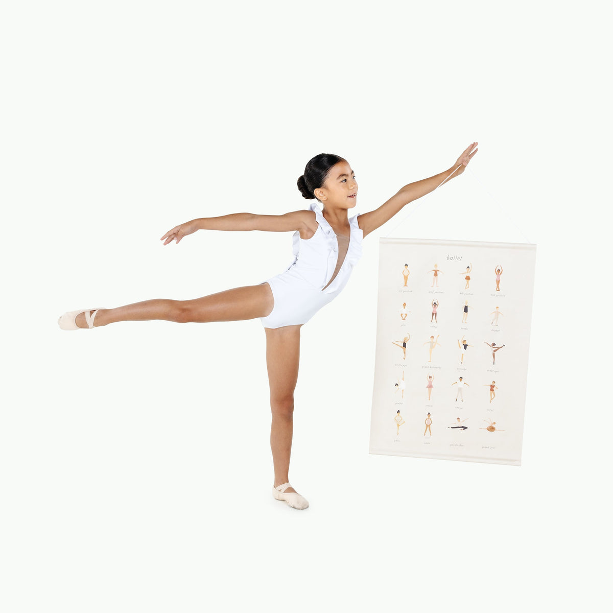 Ballet Basics@kid holding the ballet basics poster