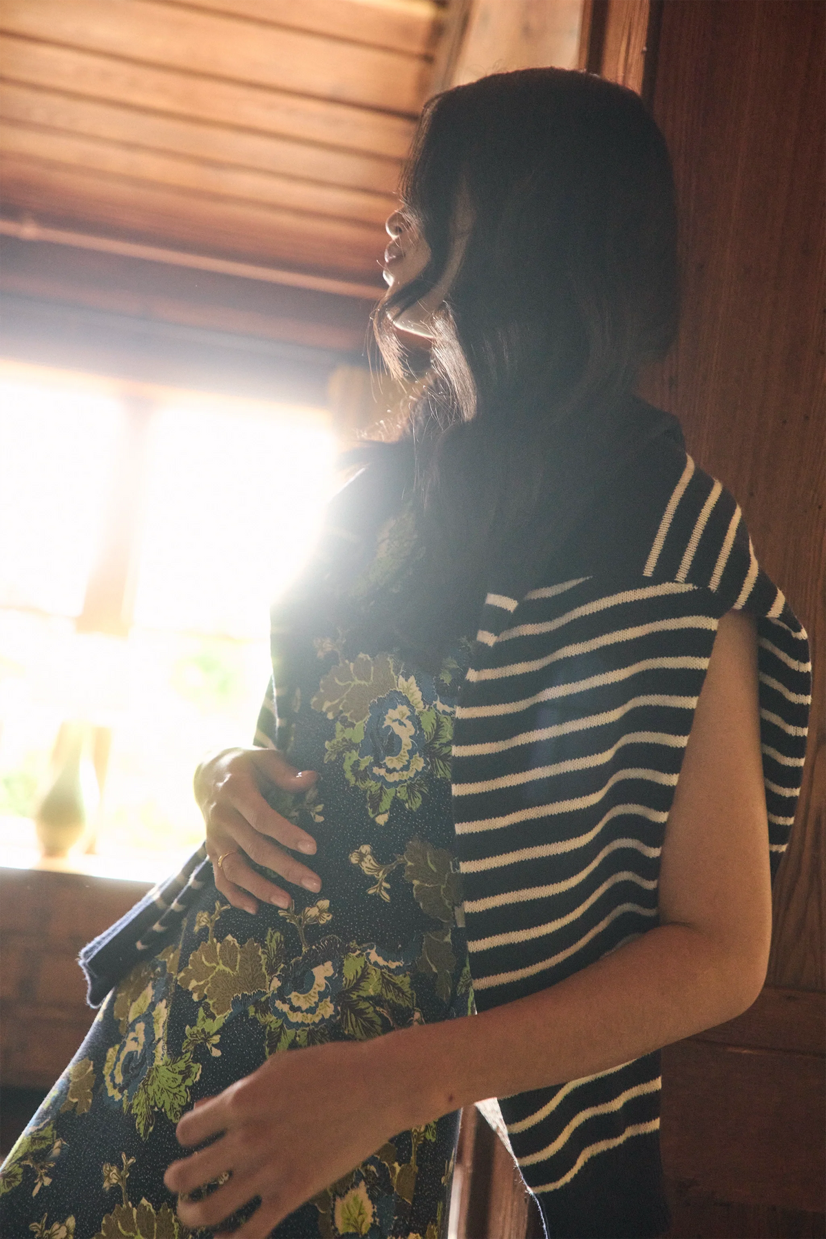 The Lewis Pullover in Midnight Blue paired with the Barker Dress in Primrose. 