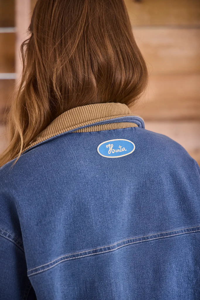 Oversized Indigo Blue barn jacket with contrast cuffs, roomy patch pocket and toggle front closure