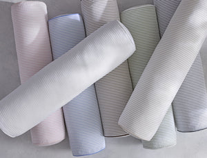 Matteo bolster pillow covers styled on bed