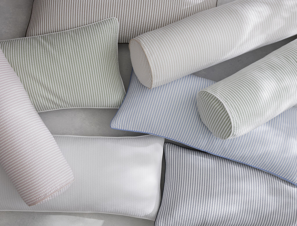 Matteo bolster and lumbar pillow covers styled on bed