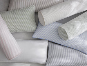Matteo bolster and lumbar pillow covers styled on bed