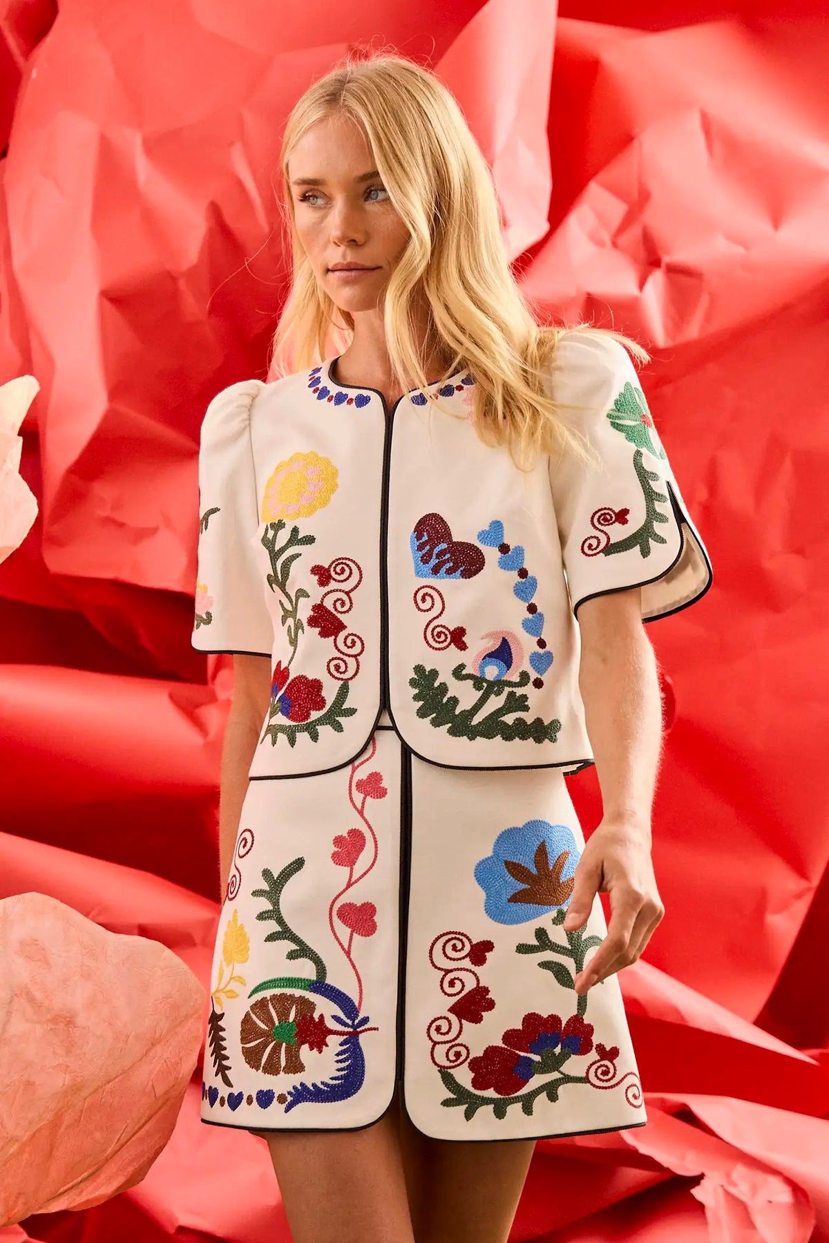 The Beeson Top is a crew neckline and elbow-length sleeves, non-fitted bodice with colorful detail