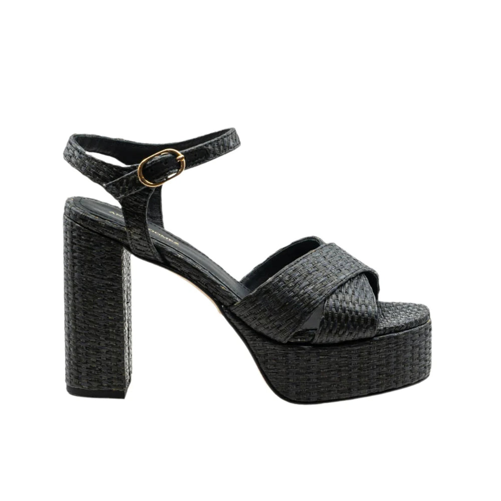 Side view of Bella raffia platform sandal with woven texture, chunky block heel and buckled ankle strap on white background