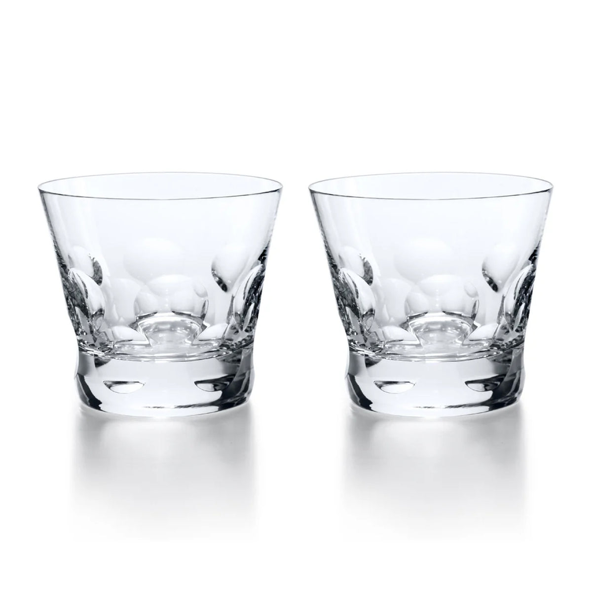 Front view of Beluga Double Old Fashion Tumbler set of two showcasing circular motifs at the bases with a white background