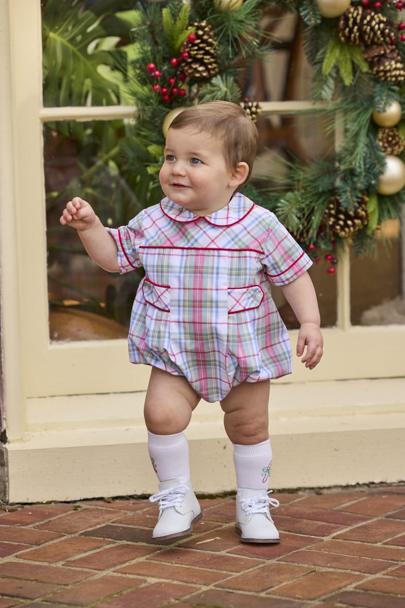 Little English traditional children's clothing.  Classic peter pan bubble in red, blue, green, yellow, and white Douglas Plaid with red piping for baby boys for Christmas