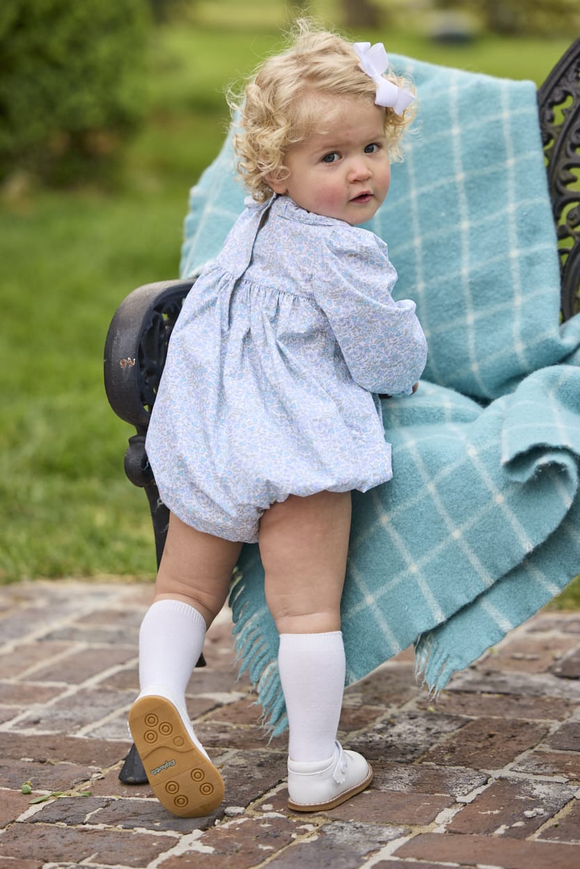 Little English traditional children's clothing.  Long sleeve bubble in aqua, blue, and green Waterbury Floral with ruffled collar for baby girls