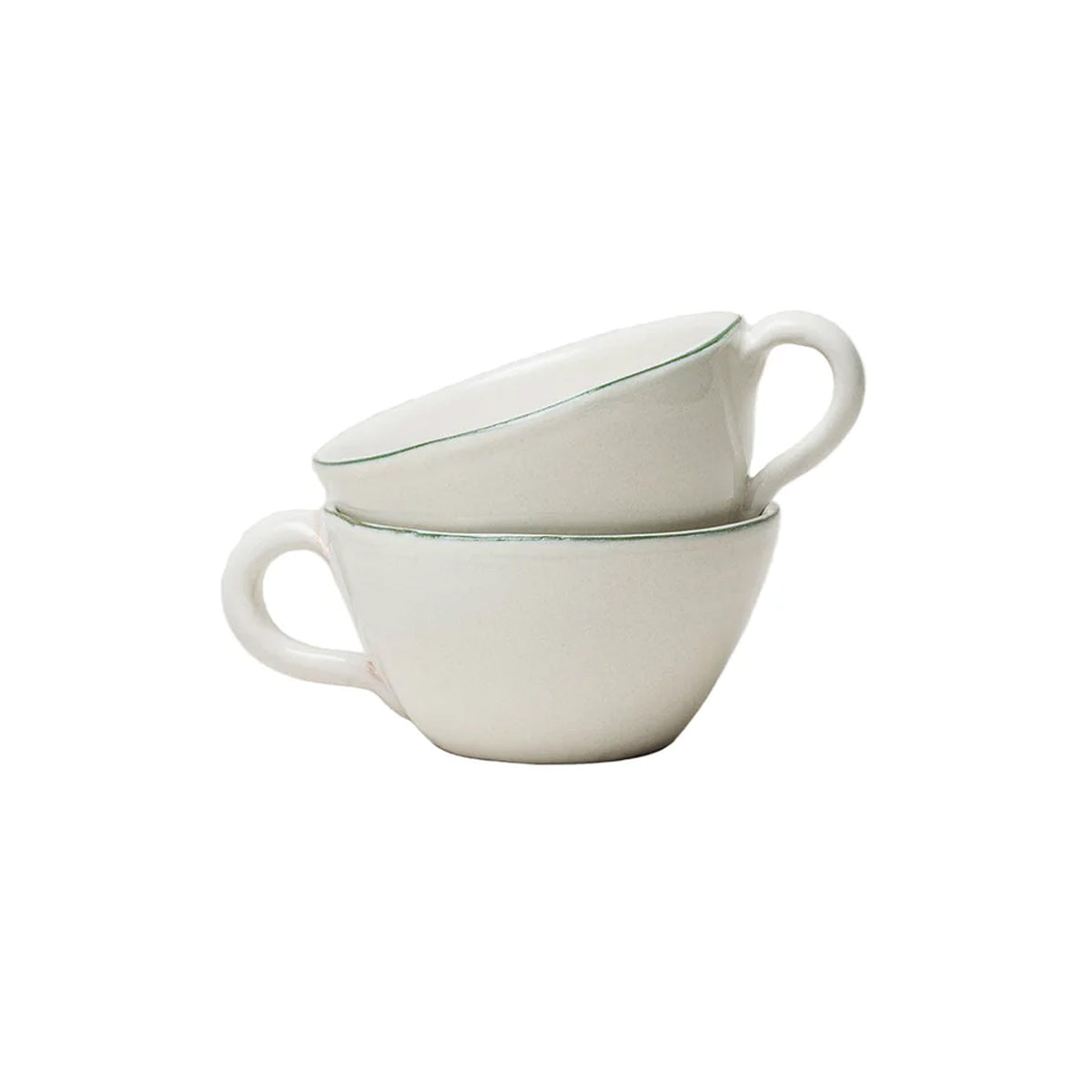 Angled view of stacked Bevagna latte cups in glazed terracotta with thin green rim on white
