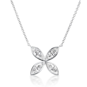 The Bezel Set Marquise Diamond Floral Pendant is a silver necklace with a four-petal flower pendant, each petal set with marquise diamonds. Displayed on a white background, the 18-inch chain ensures a perfect fit.