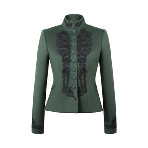 Front view of the Blaire Vert in Green jacket showcasing black silk embroidery and covered buttons against a white background