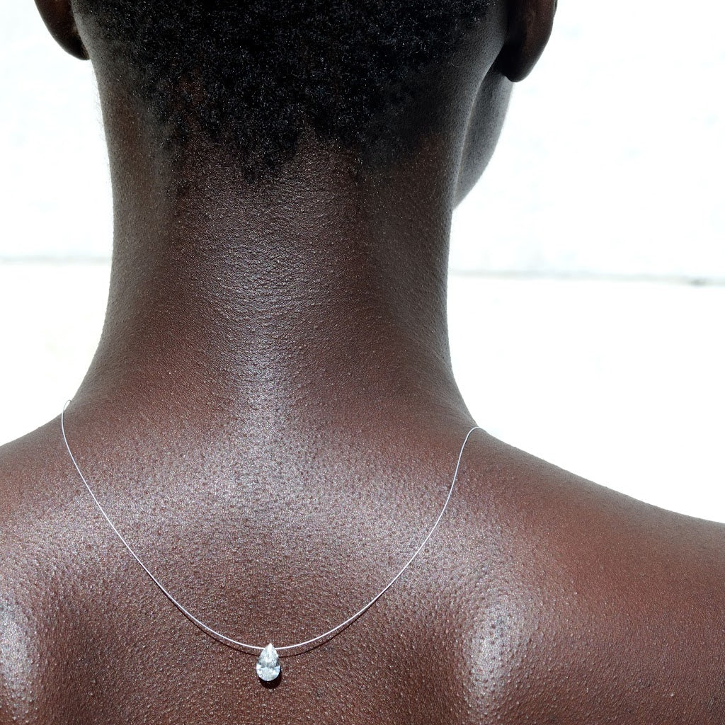 Pear Shaped “Floating” Diamond Pendant