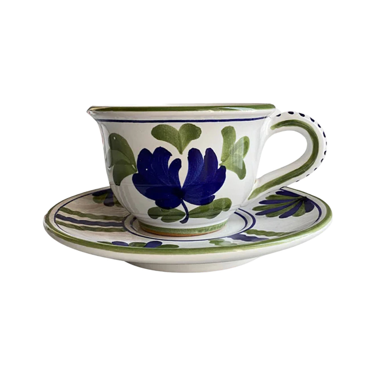 Front view of Blossom Teacup and Saucer in Blue showcasing hand painted floral motifs on a white background