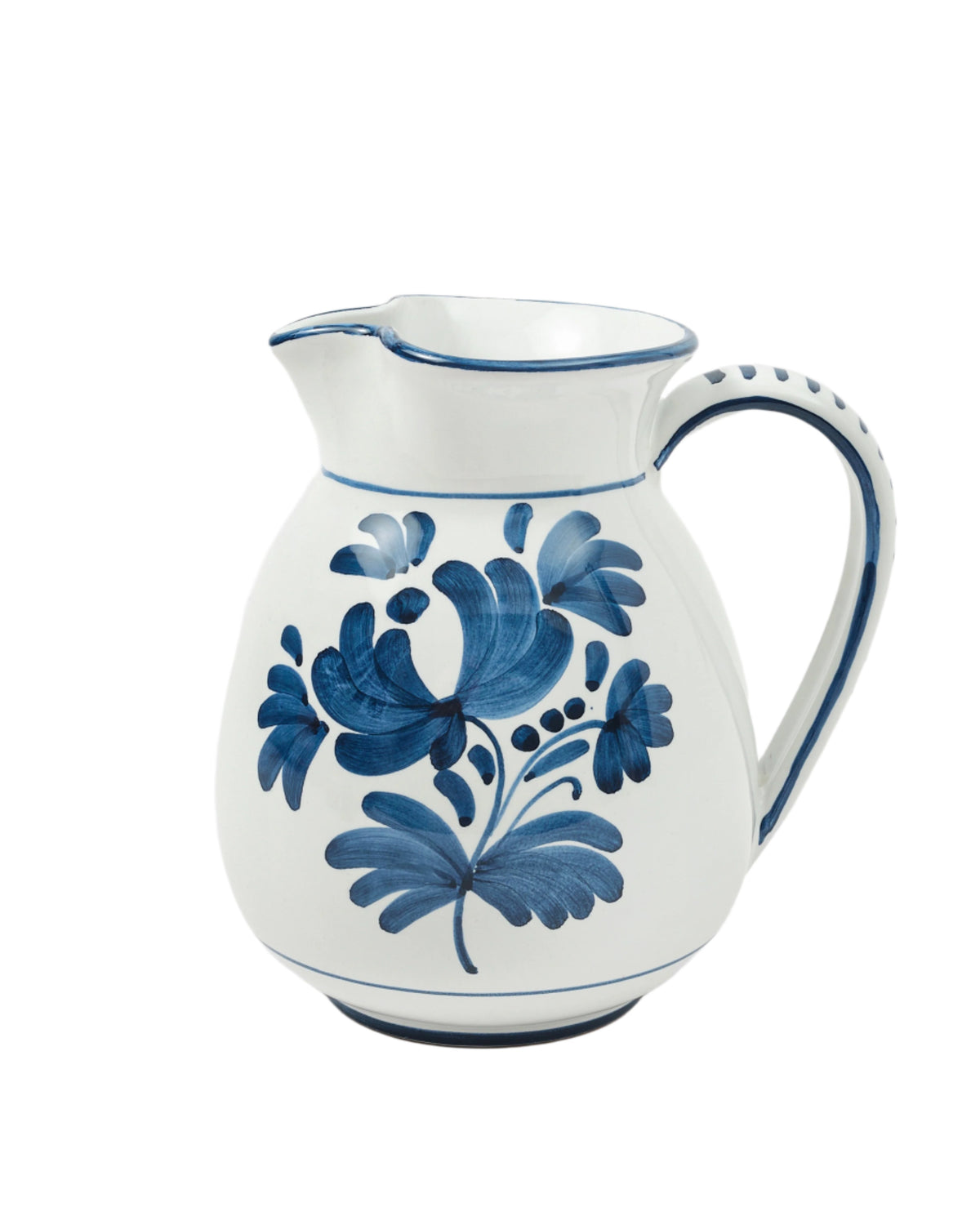 Front close-up of Blossom Jug, Midnight Blue showcasing hand-painted blue floral motifs and blue-trimmed handle on a white background