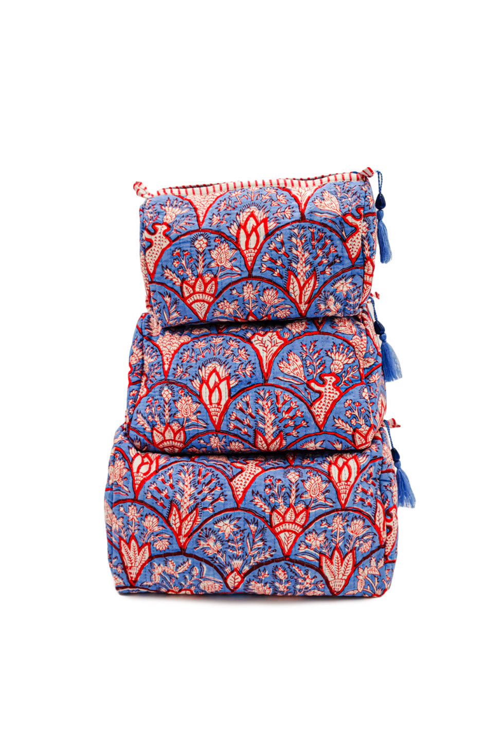 Front view of Blue Arch toiletry bag set (S, M, L) showing blue-red hand-block print and tassel zipper pulls