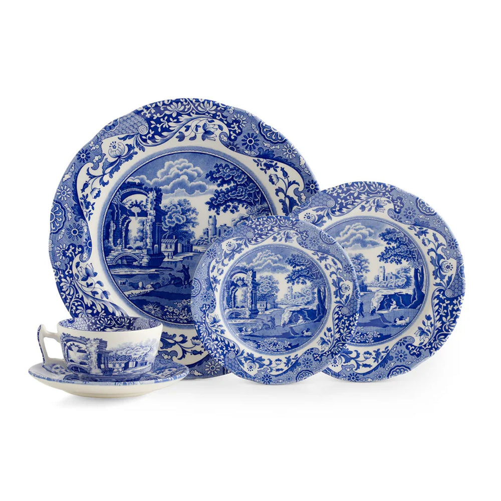 Front view of Spode Blue Italian 5-piece place setting with blue-and-white pastoral pattern on white background
