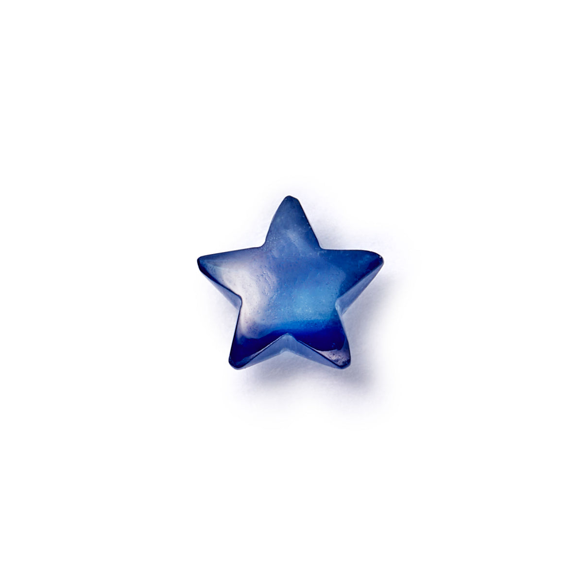 Front view of Blue Sapphire Star Charm showcasing its faceted blue star shape on a white background