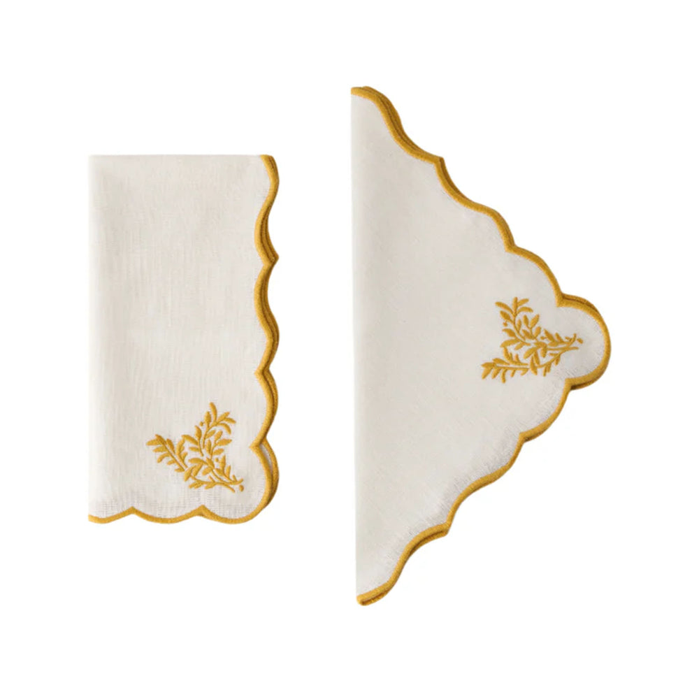 Front and folded views of the Botanica Embroidered Napkin in Yellow with scalloped edging and floral embroidery