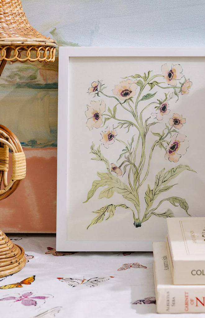 Framed Botanical Print in Slipper & Sage showing pale pink and sage watercolor flowers in a white frame