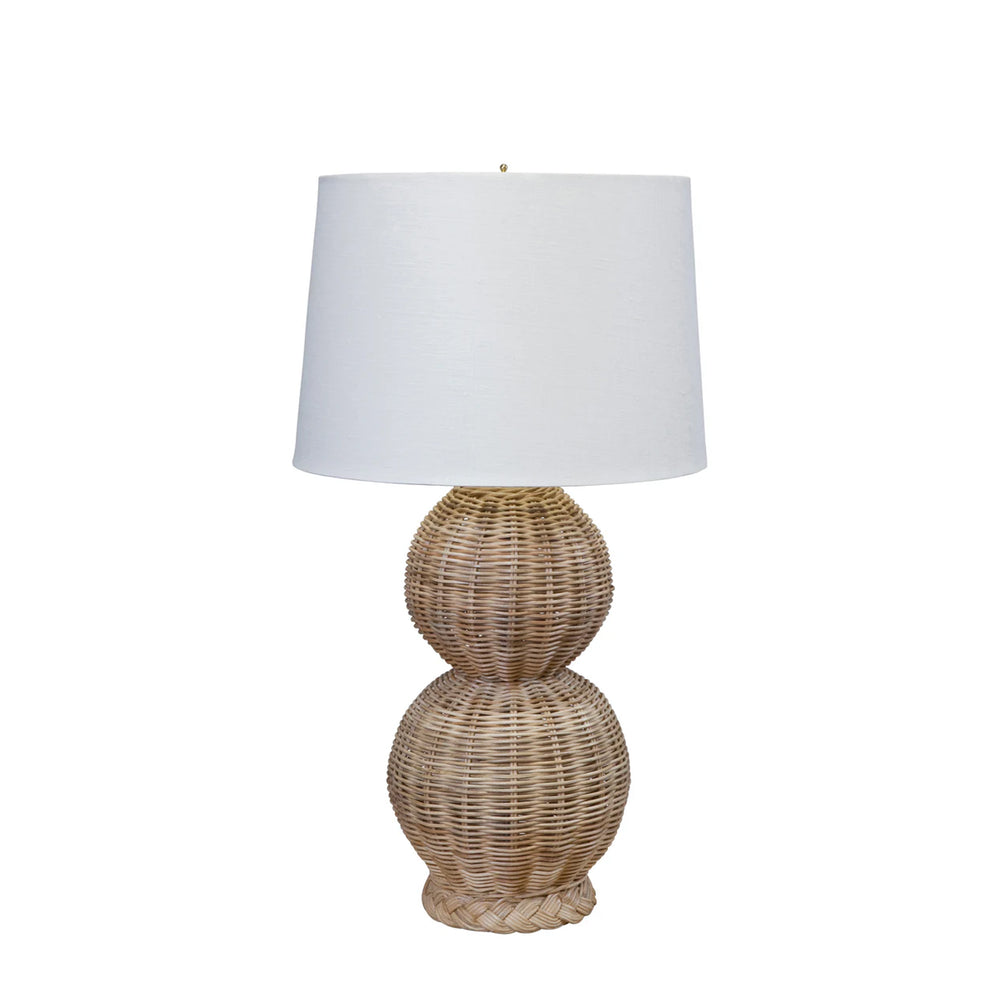 Front view of braided double-gourd lamp base in woven rattan showcasing braided texture with white drum shade on white background
