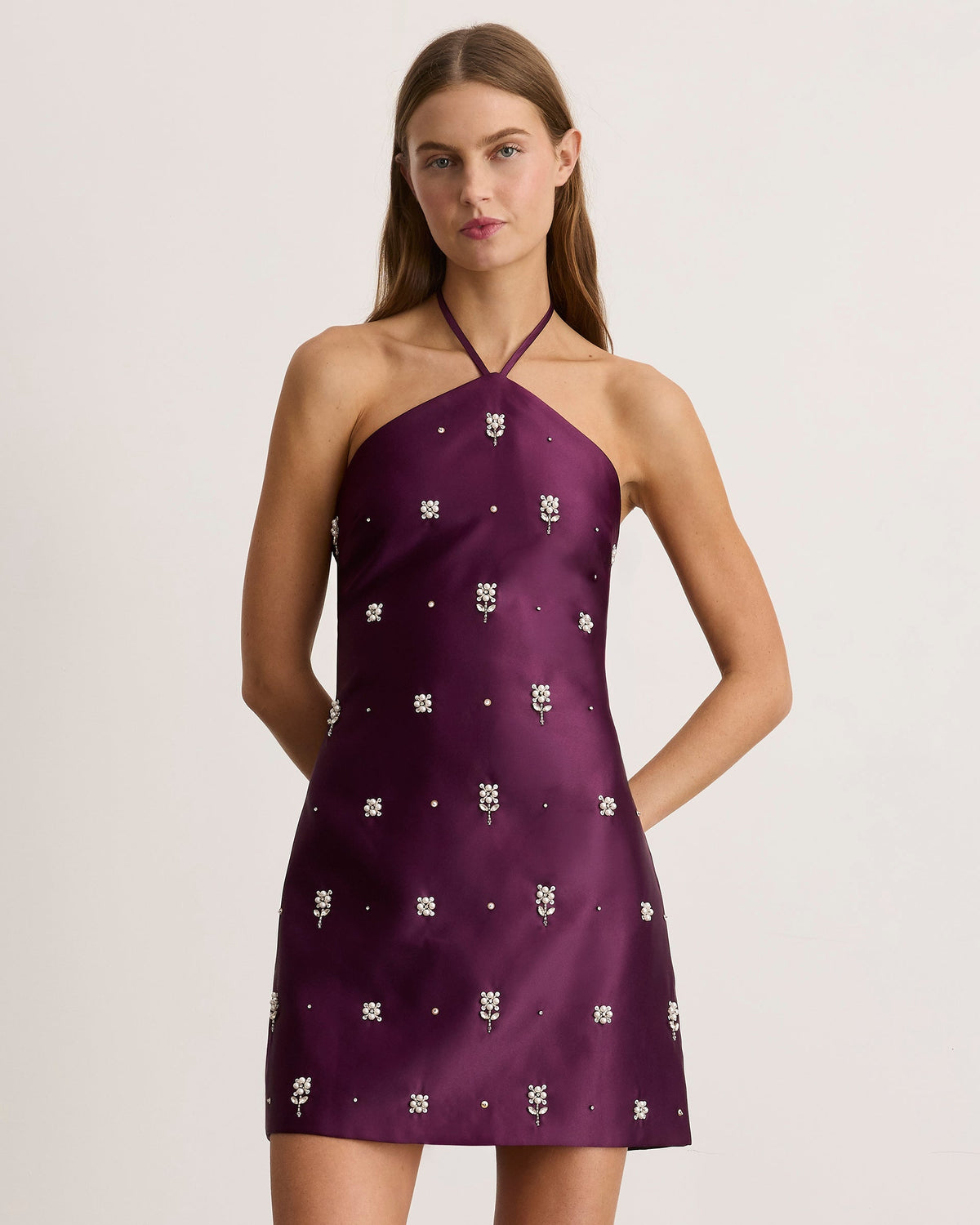 Front view of Bree Dress in Blackberry showcasing halter neckline and all-over floral embellishment on a model against a light background