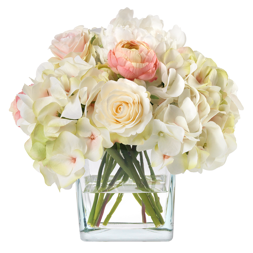 Front view of Bright Young Thing showcasing cream and pink faux hydrangeas, roses, and ranunculus in a glass cube