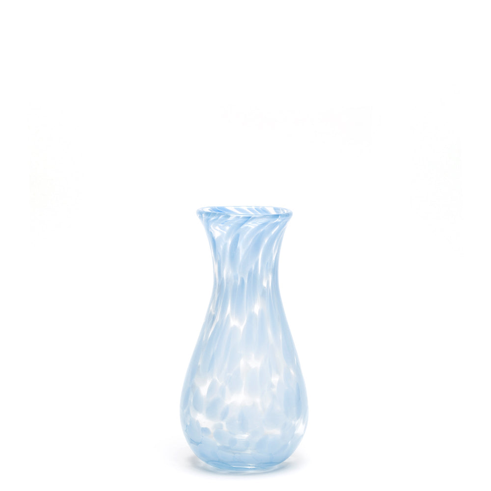 Front view of sky blue transparent bud vase showcasing hand-blown glass with blue spotted pattern on a white background