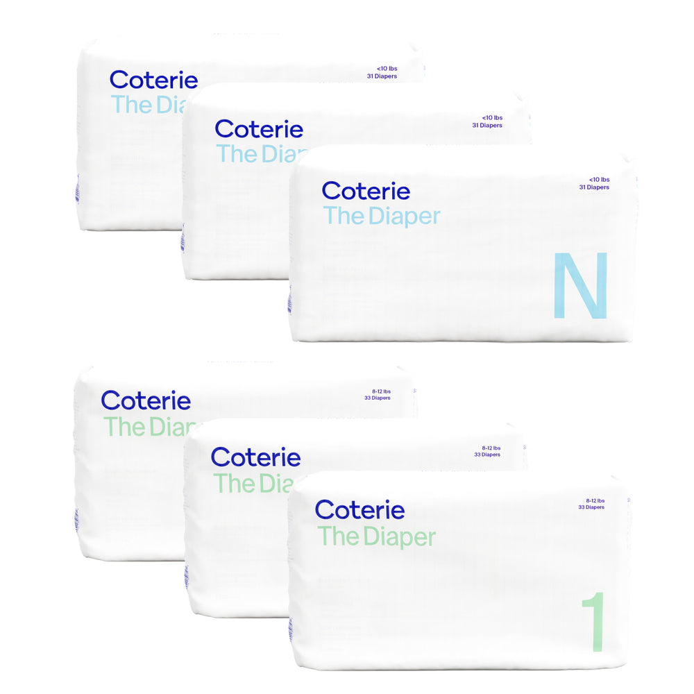 Front view of Coterie Newborn Ultra Soft Diapers Starter Kit showing three Newborn and three Size 1 packs on white background