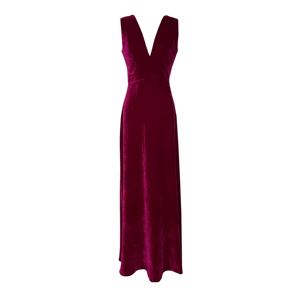 Front view of Burgundy Velvet Dress showcasing deep neckline, sleeveless silhouette, cinched waist, and high skirt slits against white background