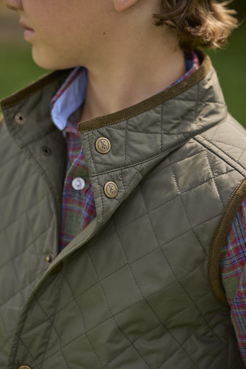 Little English traditional children's clothing.  Classic quilted vest in olive with corduroy detailing.  Unisex vest for kids