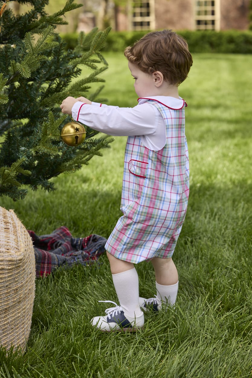 Little English traditional children's clothing.  Holiday John John set for toddler boys. Long sleeve white peter pan shirt with red piping paired with colorful red, yellow, green, blue, and white Douglas Plaid john john