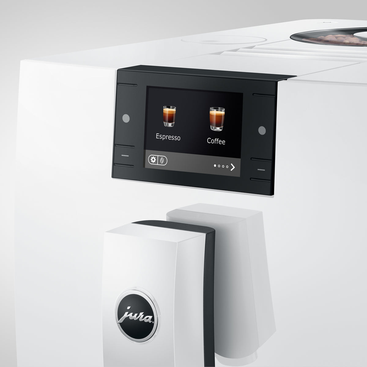 Front close-up of C9 coffee machine in piano white showcasing touchscreen labeled Espresso and Coffee and front milk spout