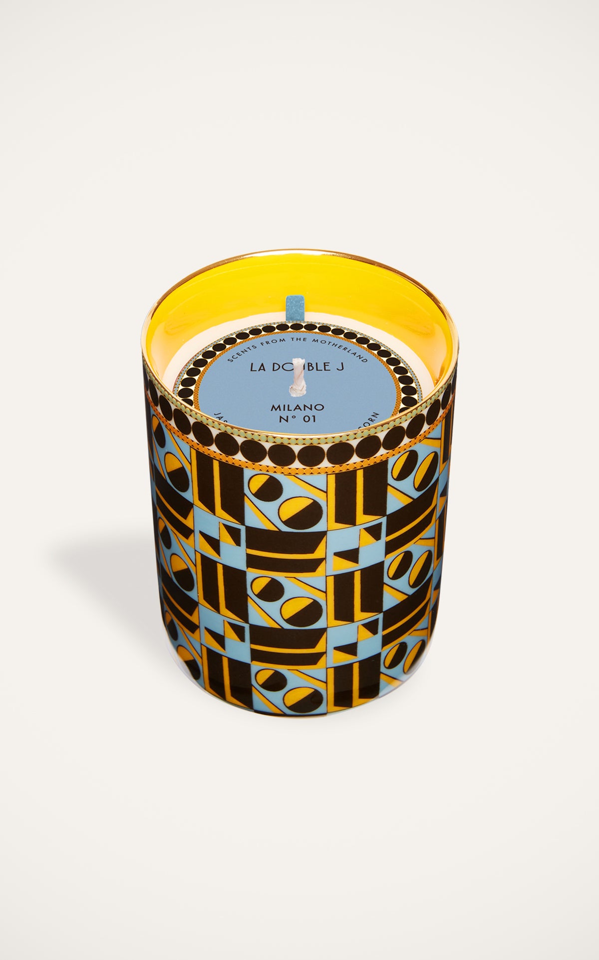 Top view of 320g Milano Multicolor candle with hand-painted vessel, gold rim, and La Double J Milano label