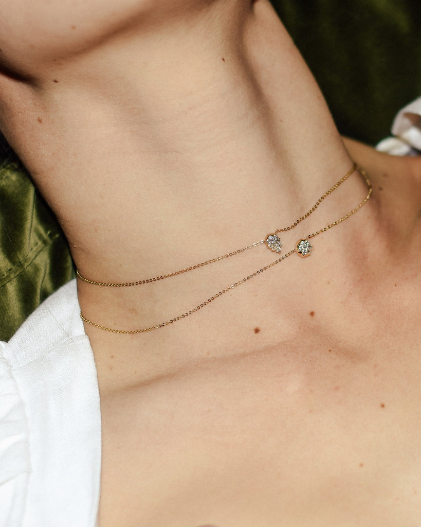 The Bullet Choker shown layered with the Venus Choker Chain., 14k yellow gold, 14k rose gold, 14k white gold