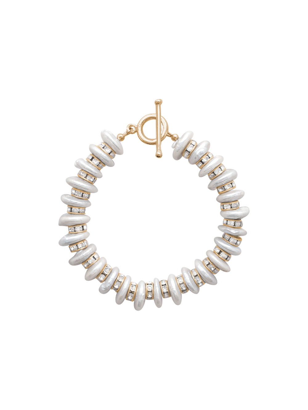 Top-down view of Clare Bracelet showing white freshwater disc pearls, crystal spacer rings and gold-plated toggle on dark background