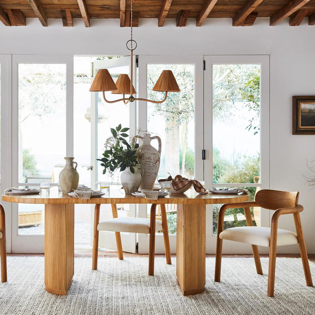 delphine chandelier over dining table